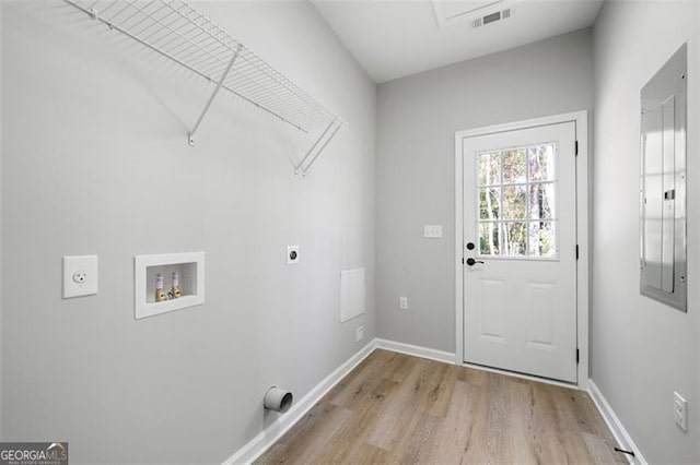 389 Campground School Rd, Dallas, GA 30157 - laundry area featuring electric dryer hookup, wood finished floors, hookup for a washing machine, and baseboards