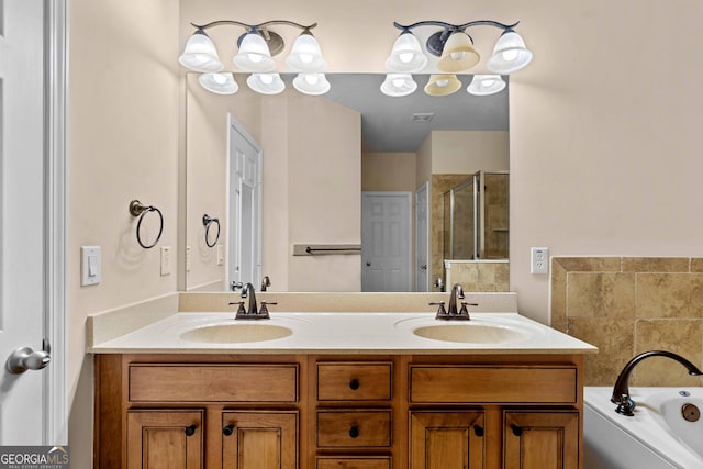 bathroom with a shower stall, a garden tub, and double vanity