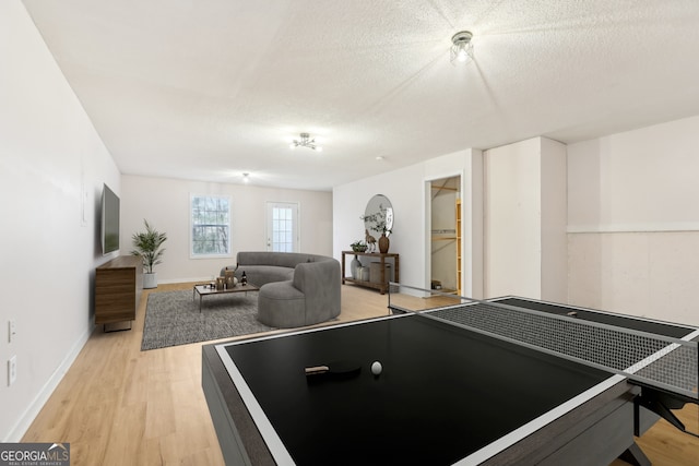 103 Timber Ridge Dr, Cartersville, GA 30121 - recreation room featuring light wood-style flooring and a textured ceiling