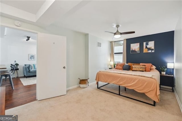 620 Peachtree St NE Unit 403, Atlanta, GA 30308 - carpeted bedroom with baseboards and a ceiling fan