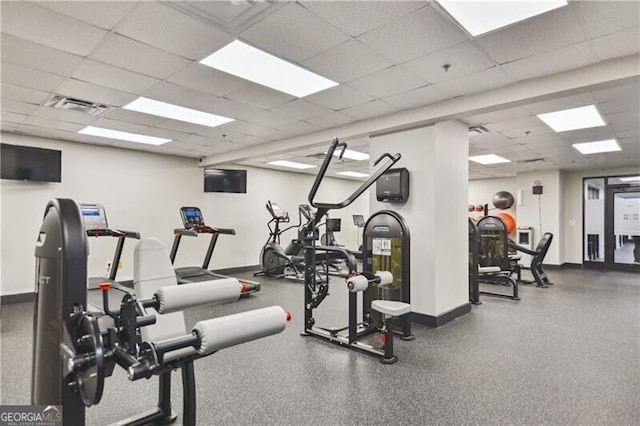 620 Peachtree St NE Unit 403, Atlanta, GA 30308 - exercise room with baseboards and a paneled ceiling