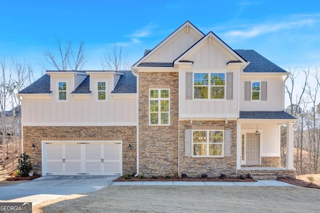 16 Grove Pointe Way SE, Cartersville, GA 30120 - view of front of property featuring concrete driveway, stone siding, board and batten siding, and a shingled roof