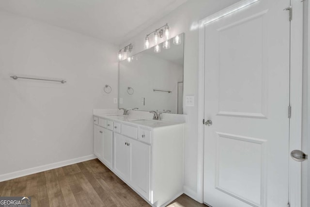 16 Grove Pointe Way SE, Cartersville, GA 30120 - bathroom featuring wood finished floors, double vanity, and baseboards
