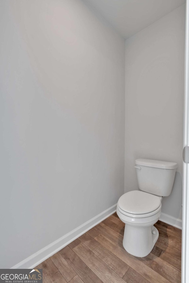 16 Grove Pointe Way SE, Cartersville, GA 30120 - bathroom with wood finished floors, baseboards, and toilet