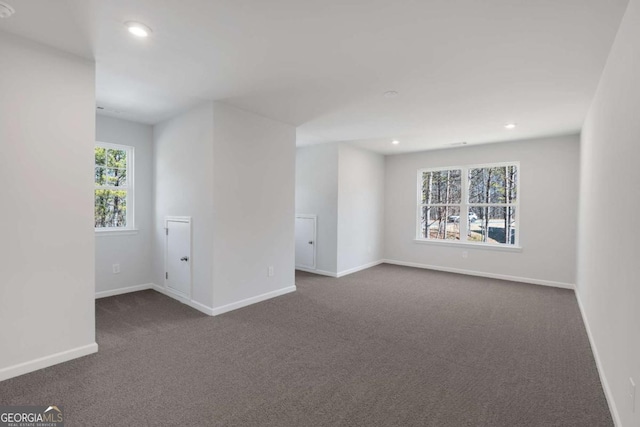 16 Grove Pointe Way SE, Cartersville, GA 30120 - unfurnished room featuring dark carpet, baseboards, and recessed lighting