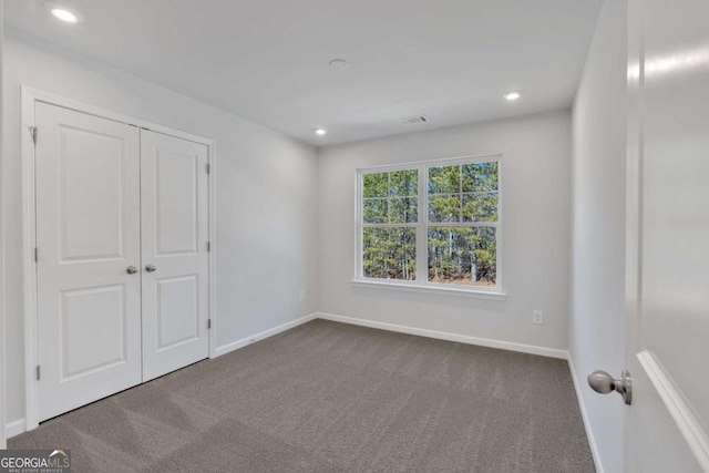 16 Grove Pointe Way SE, Cartersville, GA 30120 - unfurnished bedroom with carpet floors, baseboards, recessed lighting, and a closet