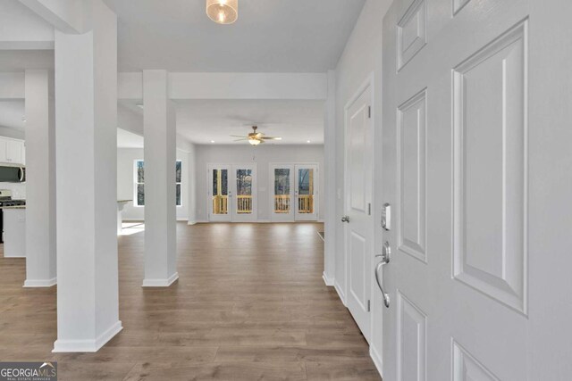 16 Grove Pointe Way SE, Cartersville, GA 30120 - entryway with wood finished floors, ceiling fan, and baseboards