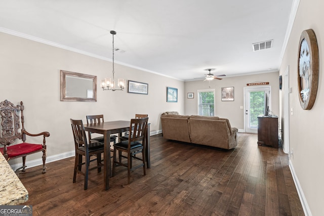 3875 Valley View Ct, Gainesville, GA 30501 - dining area featuring dark wood-style flooring, a ceiling fan, ornamental molding, and a chandelier