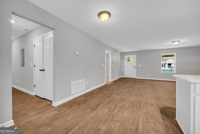 350 Maple St, Hartwell, GA 30643 - unfurnished living room featuring light wood-style floors and baseboards