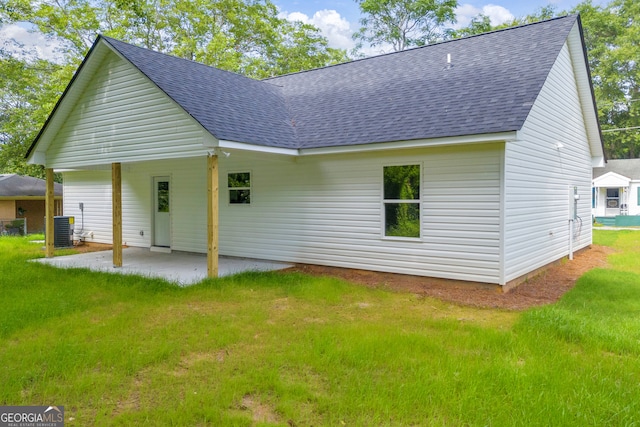 350 Maple St, Hartwell, GA 30643 - back of property with a shingled roof, a patio area, and a yard