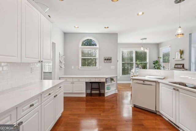 1316 Wind Chime Ct, Lawrenceville, GA 30045 - kitchen featuring white dishwasher, decorative backsplash, plenty of natural light, white cabinets, and recessed lighting