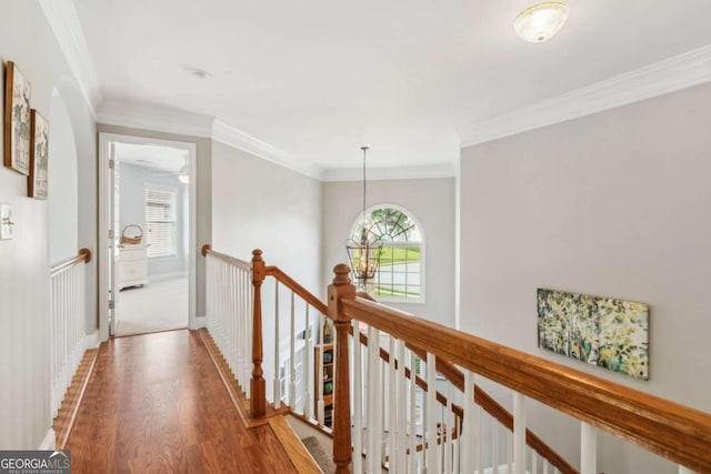 1316 Wind Chime Ct, Lawrenceville, GA 30045 - corridor with an upstairs landing, wood finished floors, and crown molding