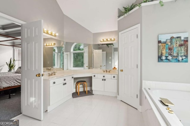 1316 Wind Chime Ct, Lawrenceville, GA 30045 - full bathroom with vaulted ceiling, a garden tub, vanity, tile patterned flooring, and connected bathroom