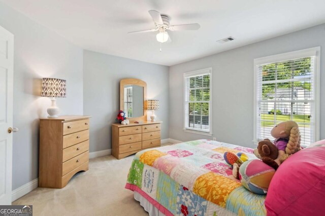1316 Wind Chime Ct, Lawrenceville, GA 30045 - bedroom featuring light colored carpet, baseboards, and ceiling fan