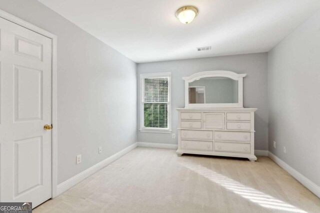 1316 Wind Chime Ct, Lawrenceville, GA 30045 - carpeted bedroom with baseboards