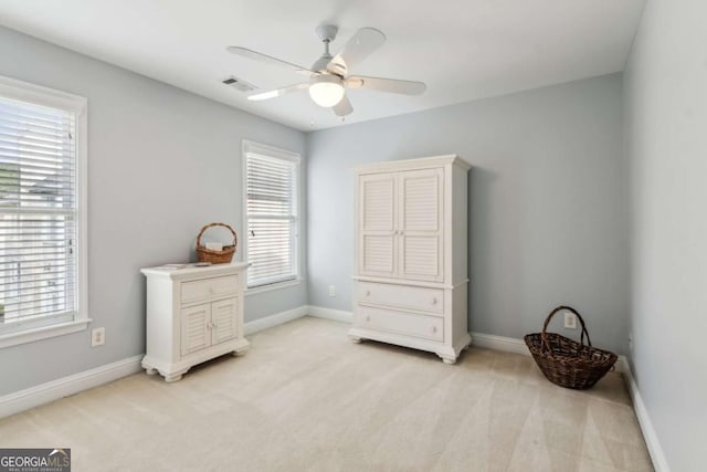 1316 Wind Chime Ct, Lawrenceville, GA 30045 - bedroom with light colored carpet, baseboards, and a ceiling fan