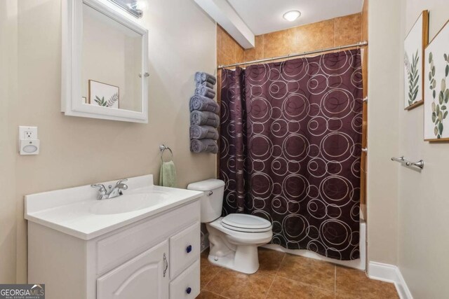 1316 Wind Chime Ct, Lawrenceville, GA 30045 - bathroom featuring curtained shower, toilet, tile patterned flooring, and vanity