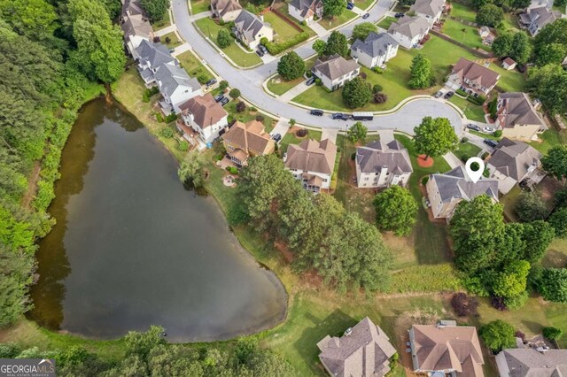 1316 Wind Chime Ct, Lawrenceville, GA 30045 - aerial view of property and surrounding area with nearby suburban area and a large body of water