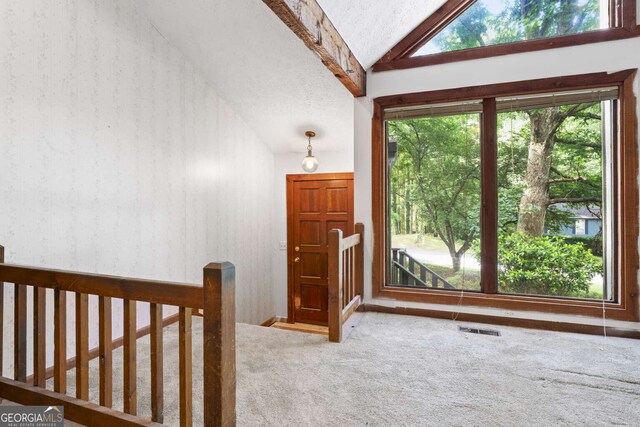 1909 Winding Creek Ln SW, Marietta, GA 30064 - foyer featuring carpet flooring, vaulted ceiling, and wallpapered walls
