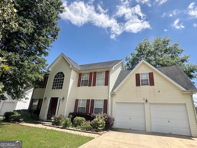 130 Hazelhurst Dr, Covington, GA 30016 - view of front facade featuring concrete driveway and roof with shingles