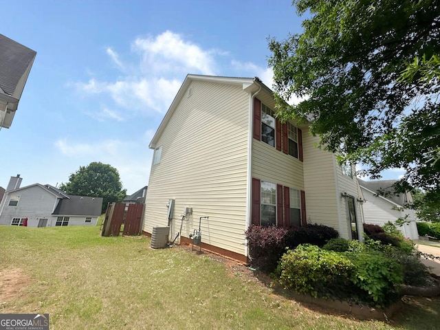 130 Hazelhurst Dr, Covington, GA 30016 - view of home's exterior with a lawn