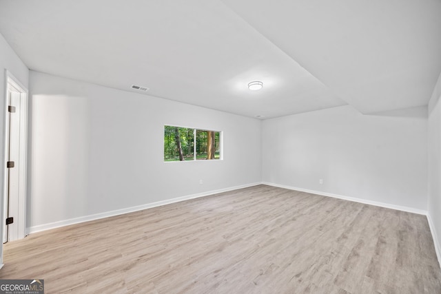 4058 Daron Ct, Ellenwood, GA 30294 - unfurnished room featuring wood finished floors and baseboards