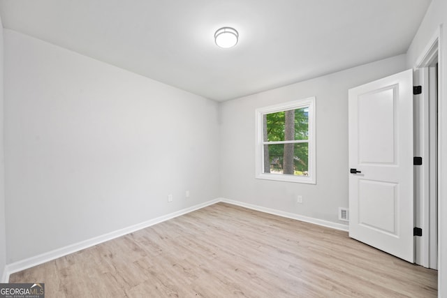 4058 Daron Ct, Ellenwood, GA 30294 - unfurnished room with light wood-type flooring and baseboards
