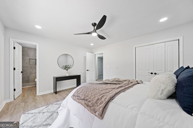 4058 Daron Ct, Ellenwood, GA 30294 - bedroom featuring a closet, light wood-style floors, baseboards, ensuite bathroom, and recessed lighting