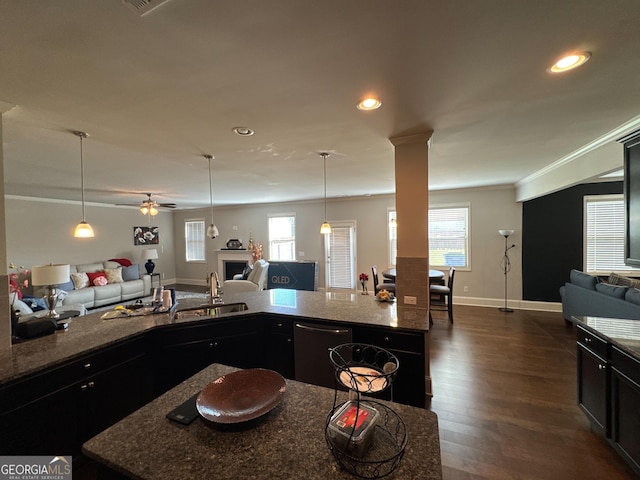 419 Woodmill Way SW, South Fulton, GA 30331 - kitchen with open floor plan, a sink, dishwasher, dark stone countertops, and recessed lighting