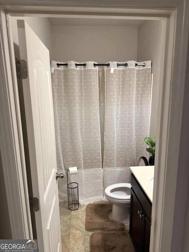 419 Woodmill Way SW, South Fulton, GA 30331 - full bath with vanity, toilet, and tile patterned flooring