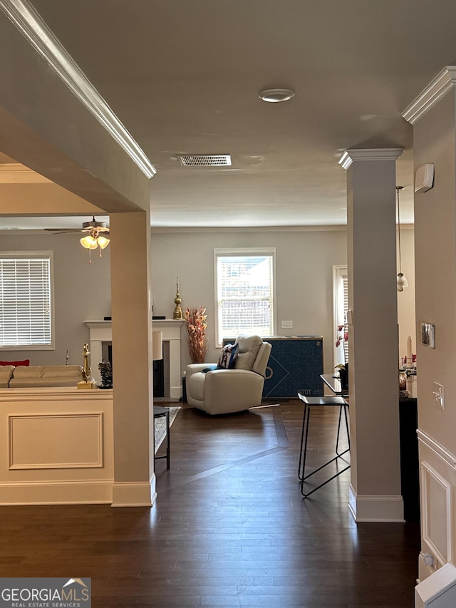 419 Woodmill Way SW, South Fulton, GA 30331 - living area featuring crown molding, a fireplace, a ceiling fan, dark wood-style flooring, and baseboards