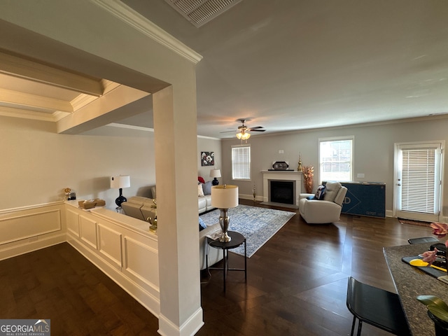 419 Woodmill Way SW, South Fulton, GA 30331 - living room with crown molding, a ceiling fan, a fireplace with flush hearth, and dark wood finished floors