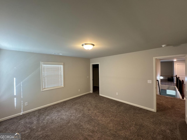 419 Woodmill Way SW, South Fulton, GA 30331 - unfurnished room with dark colored carpet and baseboards