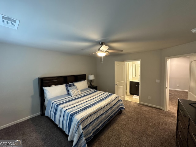419 Woodmill Way SW, South Fulton, GA 30331 - carpeted bedroom with baseboards, a ceiling fan, and connected bathroom
