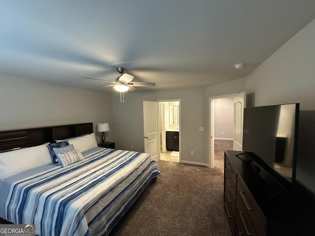 419 Woodmill Way SW, South Fulton, GA 30331 - bedroom with dark colored carpet, a ceiling fan, ensuite bath, and baseboards