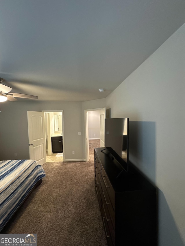 419 Woodmill Way SW, South Fulton, GA 30331 - carpeted bedroom with baseboards, a ceiling fan, and ensuite bath