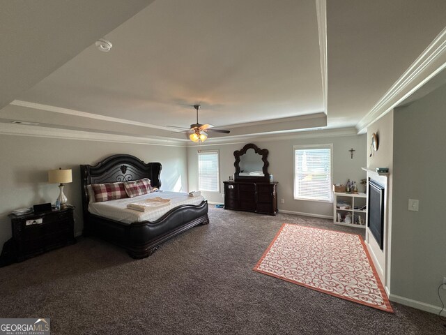 419 Woodmill Way SW, South Fulton, GA 30331 - bedroom featuring a tray ceiling, ornamental molding, carpet floors, a fireplace, and baseboards