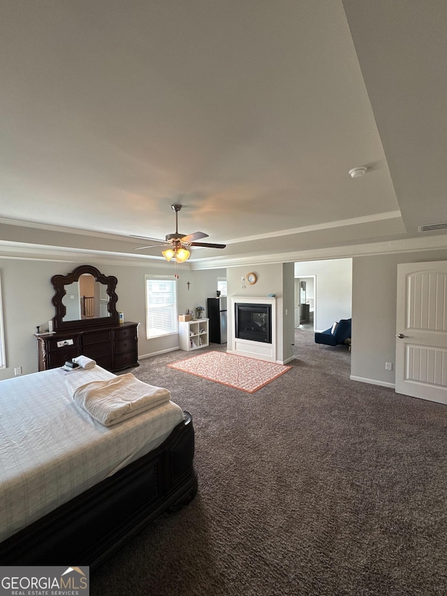 419 Woodmill Way SW, South Fulton, GA 30331 - carpeted bedroom featuring baseboards, a glass covered fireplace, and a ceiling fan