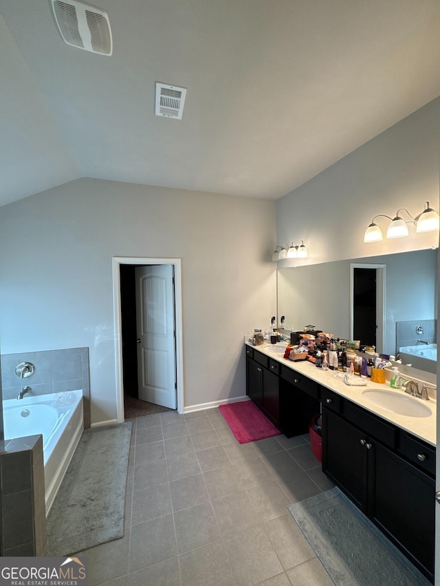 419 Woodmill Way SW, South Fulton, GA 30331 - full bath with a bath, lofted ceiling, vanity, baseboards, and tile patterned flooring