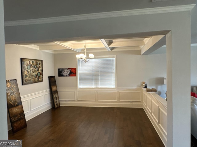 419 Woodmill Way SW, South Fulton, GA 30331 - unfurnished dining area featuring dark wood-style floors, a chandelier, beam ceiling, ornamental molding, and a decorative wall