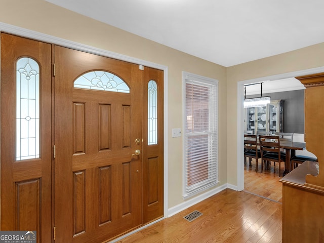 8117 Spivey Rd, Jonesboro, GA 30236 - entrance foyer with light wood-style floors and baseboards