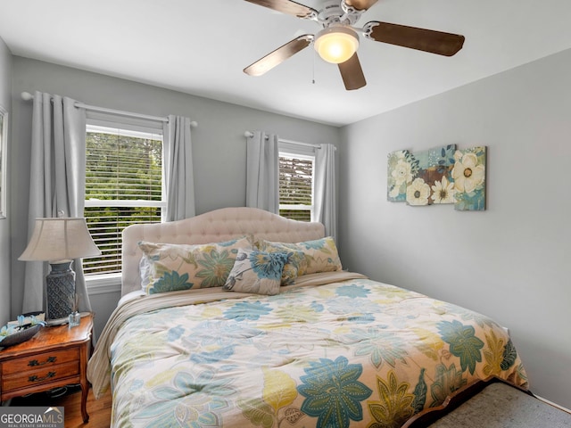 8117 Spivey Rd, Jonesboro, GA 30236 - bedroom with a ceiling fan and wood finished floors