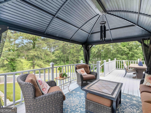 8117 Spivey Rd, Jonesboro, GA 30236 - deck featuring a gazebo and view of scattered trees