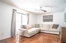 1202 Laurel Cliff Dr SE, Smyrna, GA 30082 - bedroom with wood finished floors