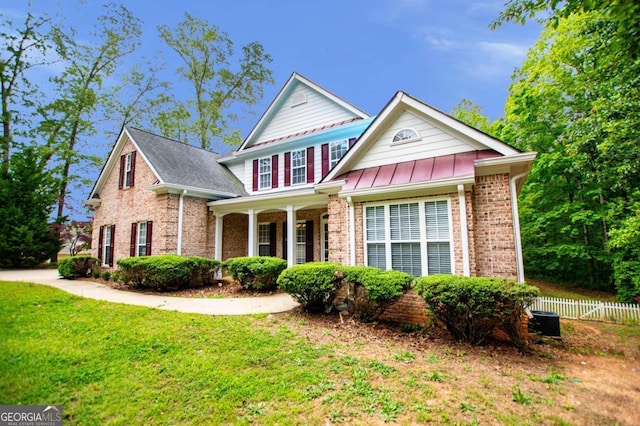 5995 Azalea Ridge Dr, Douglasville, GA 30135 - view of front of property with brick siding, cooling unit, and covered porch