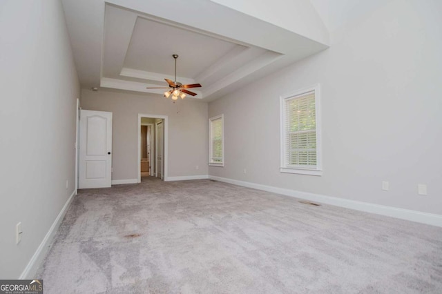 5995 Azalea Ridge Dr, Douglasville, GA 30135 - carpeted spare room featuring a raised ceiling, a ceiling fan, and baseboards