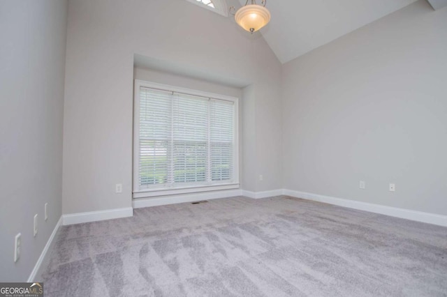 5995 Azalea Ridge Dr, Douglasville, GA 30135 - carpeted spare room featuring healthy amount of natural light, lofted ceiling, and baseboards