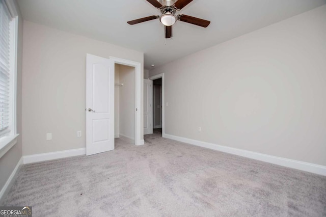 5995 Azalea Ridge Dr, Douglasville, GA 30135 - unfurnished bedroom with carpet floors, a spacious closet, baseboards, ceiling fan, and a closet