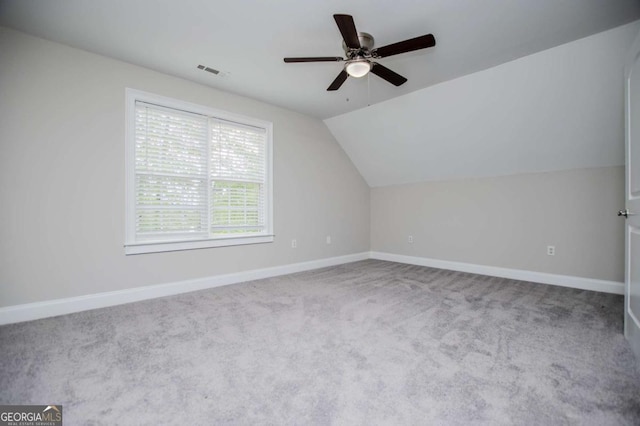 5995 Azalea Ridge Dr, Douglasville, GA 30135 - bonus room featuring carpet, a ceiling fan, vaulted ceiling, and baseboards