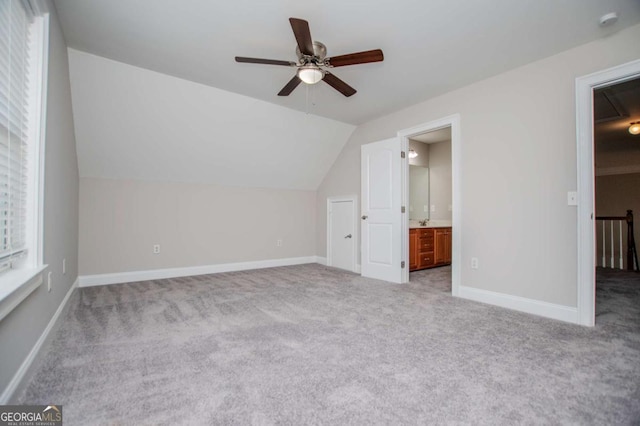 5995 Azalea Ridge Dr, Douglasville, GA 30135 - bonus room with carpet, ceiling fan, attic access, vaulted ceiling, and baseboards